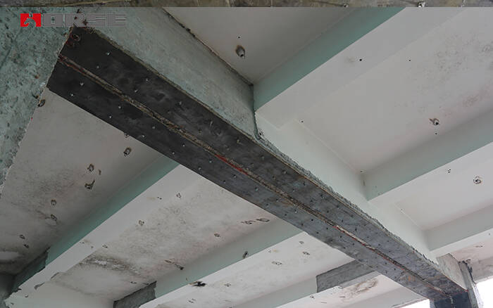 Strengthening of beams and slabs with steel plate