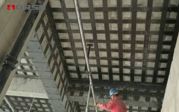 Slab crack strengthening by FRP wrap