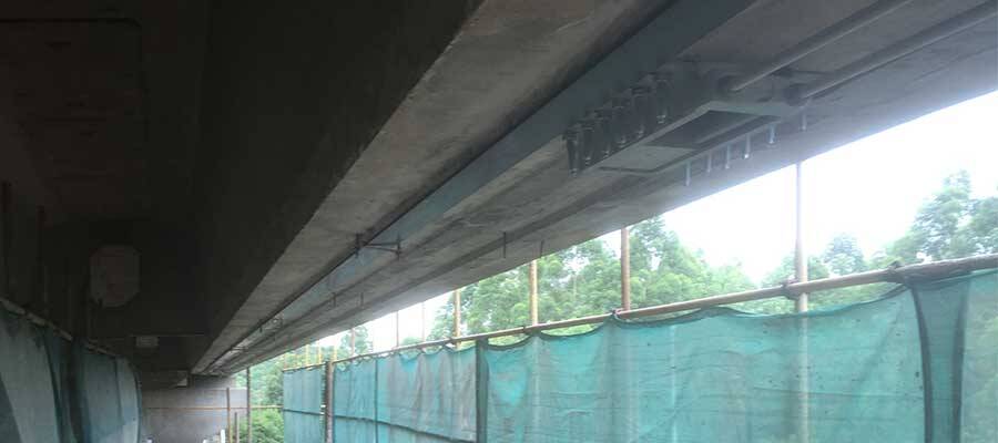 Prestressed carbon fiber plate reinforcement bridge