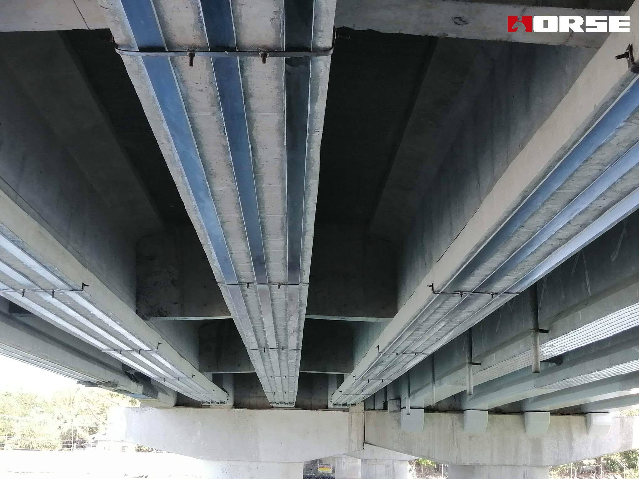 Girder Strengthening with Prestressed CFRP Plate