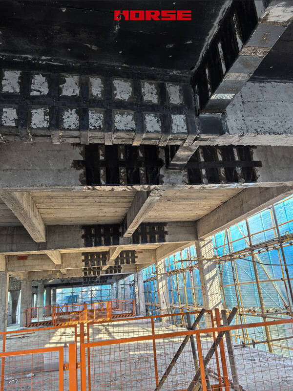 Rehabilitation of Reinforced Concrete Beams Using Carbon Fiber