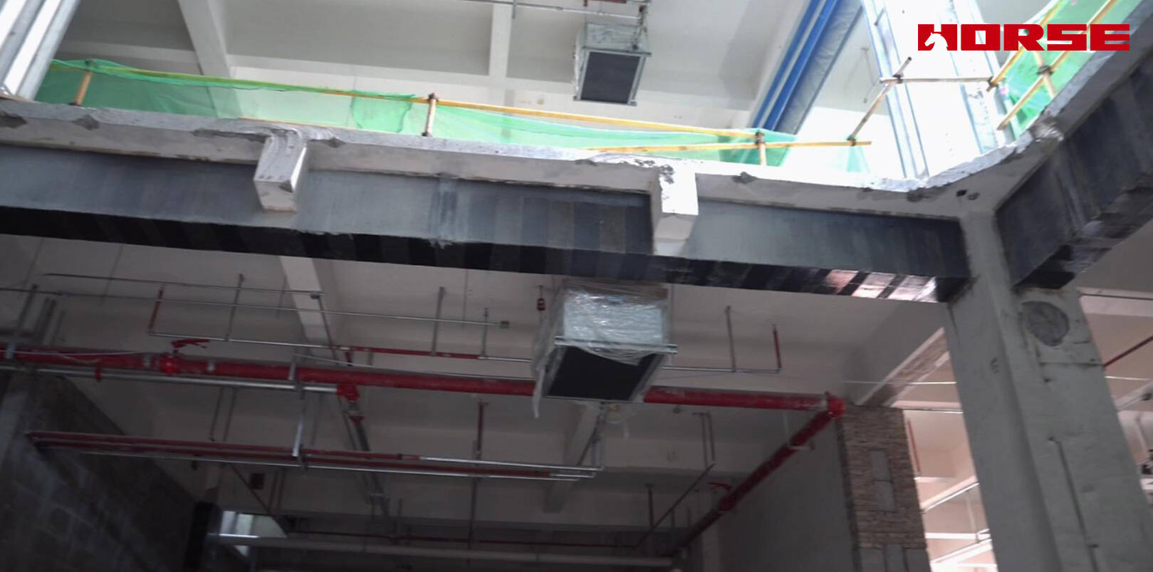 Structural Retrofit with Carbon Fiber after Floor Slab Demolition Structural Retrofit with Carbon Fiber after Floor Slab Demolition