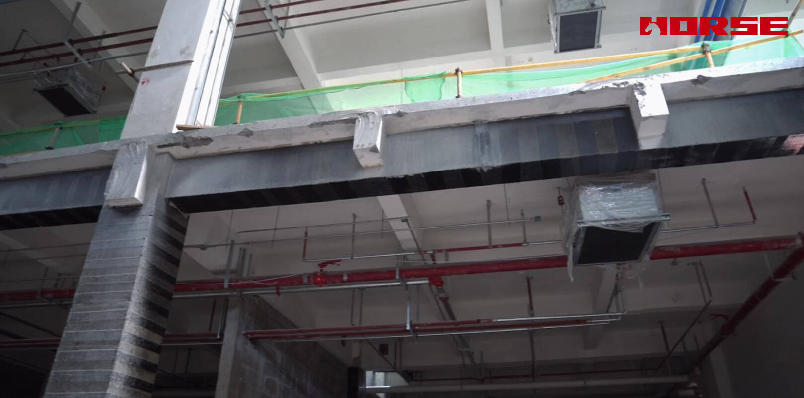 Structural Retrofit with Carbon Fiber after Floor Slab Demolition Structural Retrofit with Carbon Fiber after Floor Slab Demolition