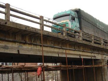 Prestressed CFRP laminate for reinforced bridge